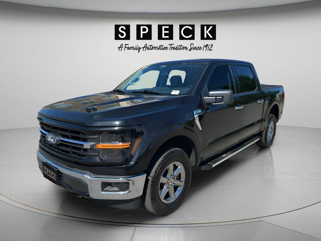 2025 Ford F-150 XLT in Agate Black Metallic — front three-quarter view