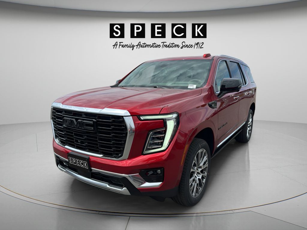 2026 GMC Yukon Denali in Volcanic Red Tintcoat — front three-quarter view