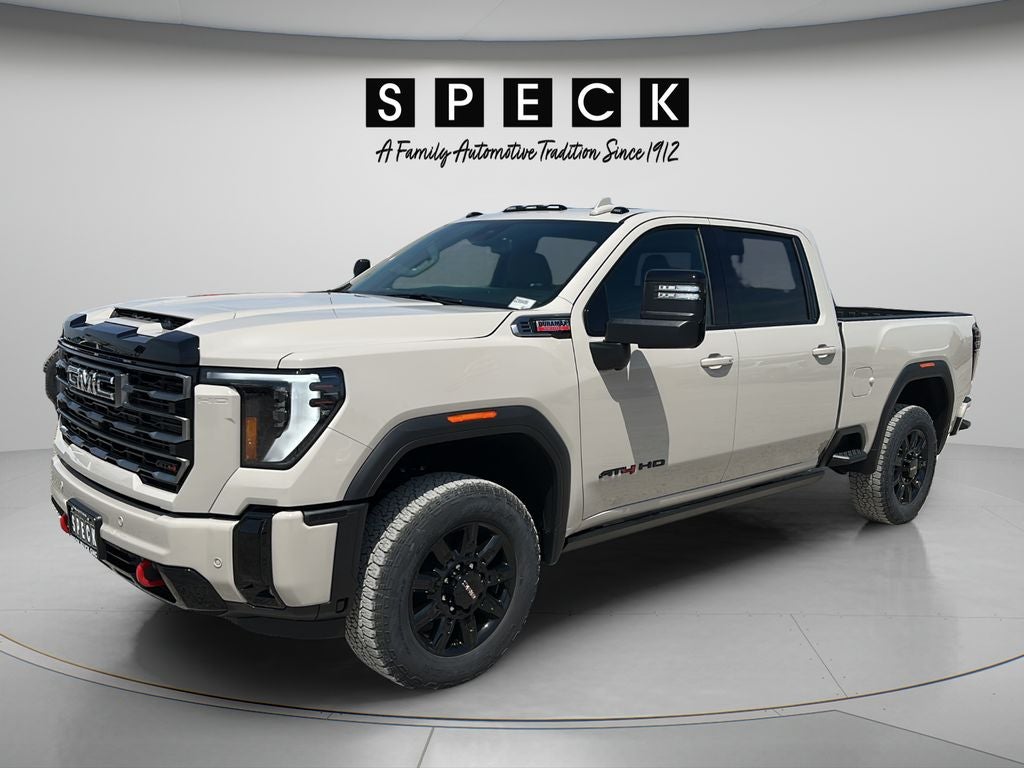 2026 GMC Sierra 2500 HD AT4 in Coastal Dune — front three-quarter view