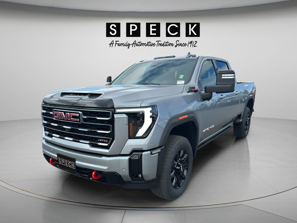 2026 GMC Sierra 3500 HD AT4 in Sterling Metallic — front three-quarter view