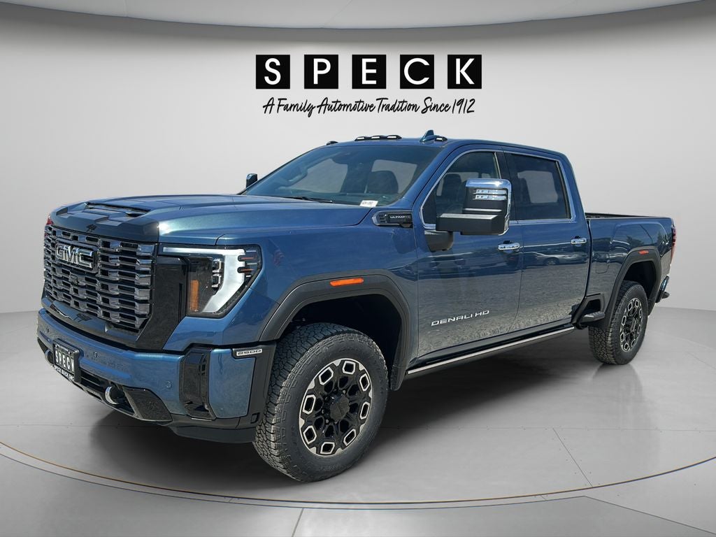 2026 GMC Sierra 2500 HD Denali Ultimate in Downpour Metallic — front three-quarter view