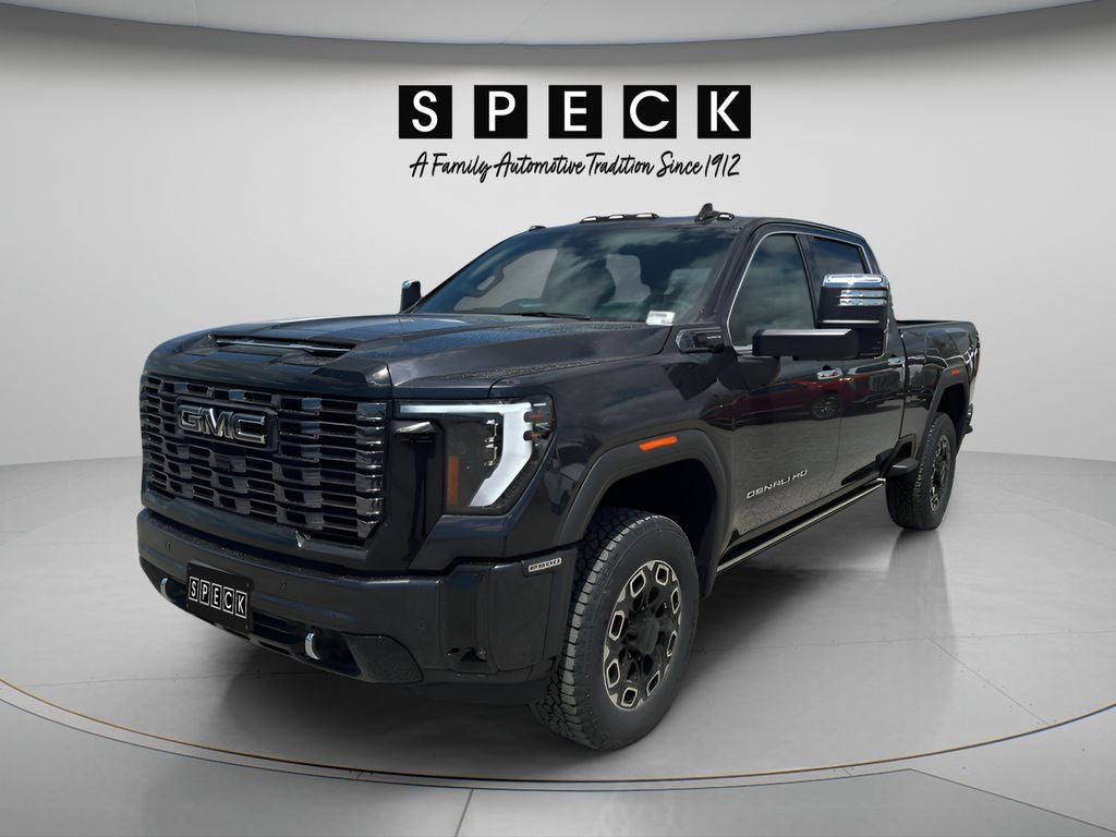 2026 GMC Sierra 2500 HD Denali Ultimate in Titanium Rush Metallic — front three-quarter view