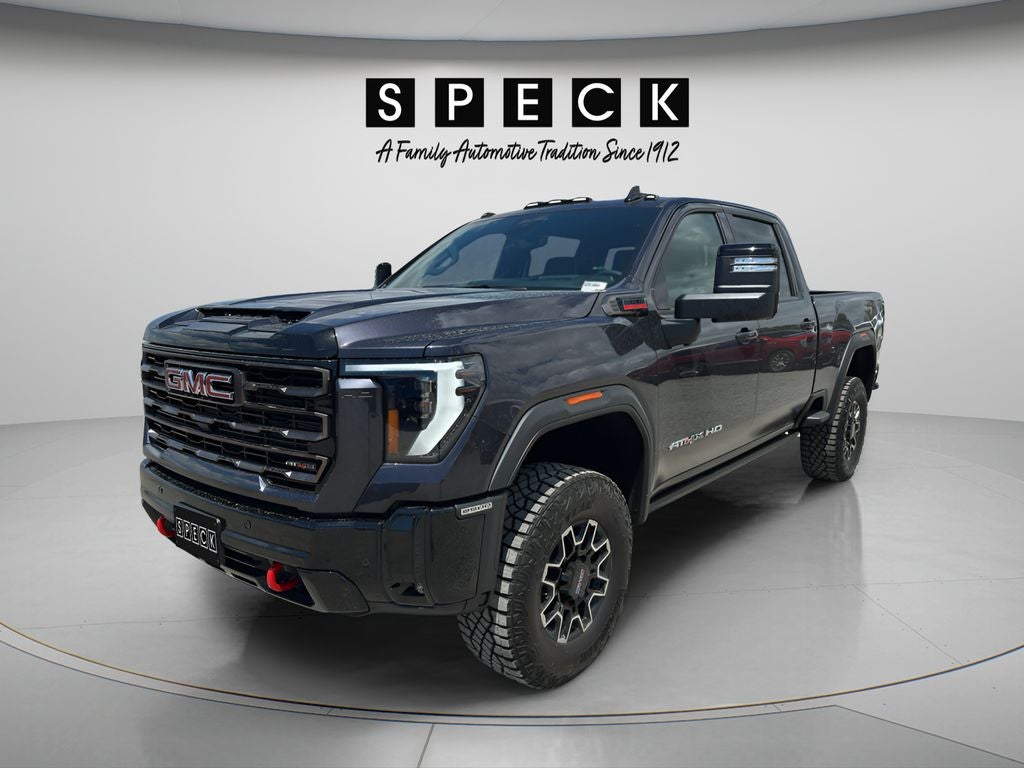 2026 GMC Sierra 2500 HD AT4X in Titanium Rush Metallic — front three-quarter view
