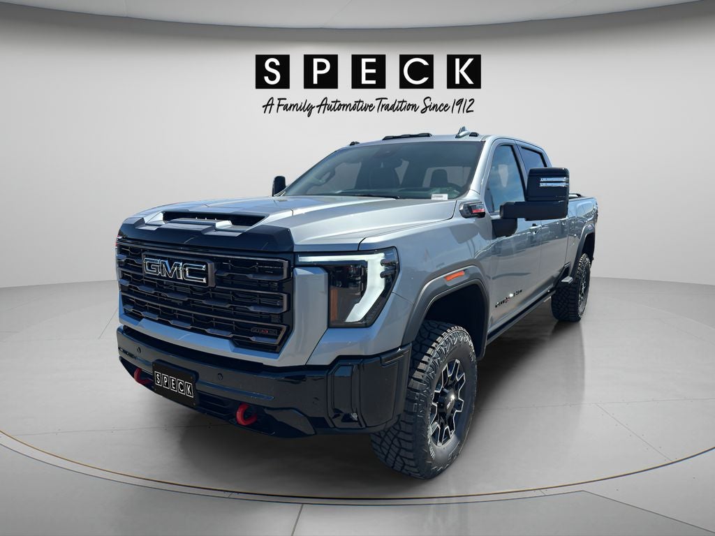 2026 GMC Sierra 2500 HD AT4X in Sterling Metallic — front three-quarter view