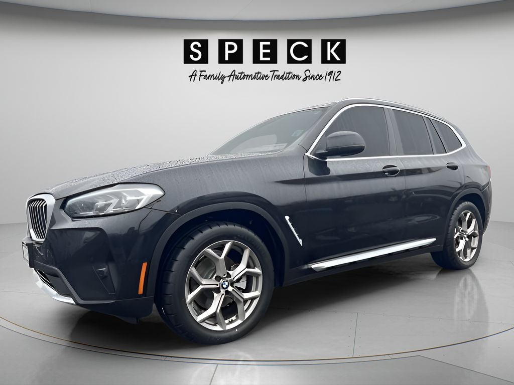 2022 BMW X3 xDrive30i in Black Sapphire Metallic — front three-quarter view