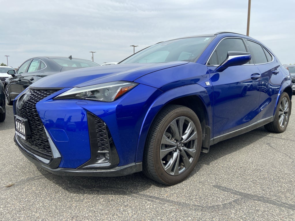 2024 Lexus UX 250h F Sport in Ultrasonic Blue Mica 2.0 With Obsidian Roof — front three-quarter view